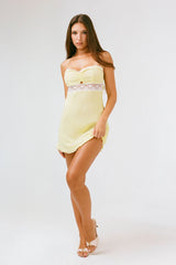 THE SCARLET DRESS IN YELLOW