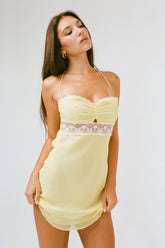 THE SCARLET DRESS IN YELLOW