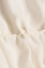 Cut-Out Semi-Sheer Ruched Halterneck Crop Top in Ivory