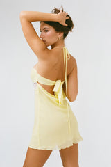 THE SCARLET DRESS IN YELLOW